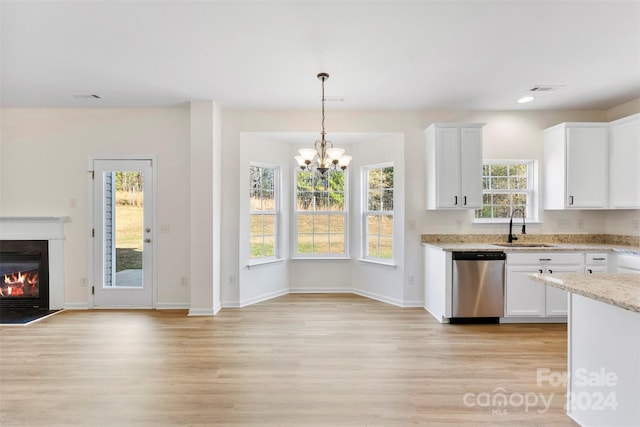 1805 Lexington Ave, Monroe, NC 28112 - kitchen with stainless steel dishwasher, a sink, light wood-style flooring, white cabinetry, and recessed lighting