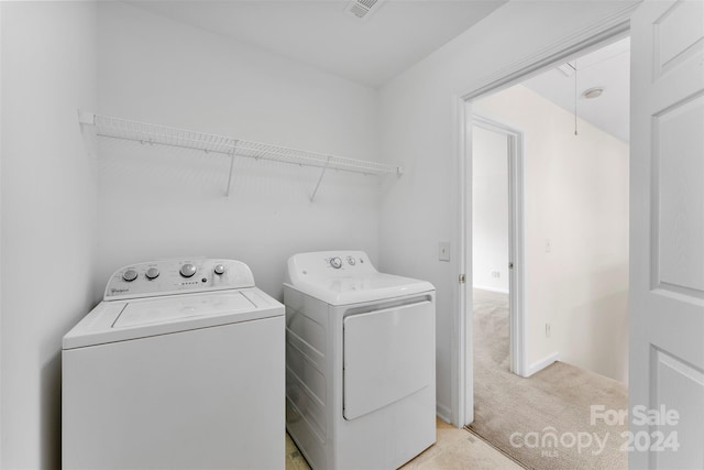 1805 Lexington Ave, Monroe, NC 28112 - washroom featuring washing machine and dryer, light colored carpet, and attic access