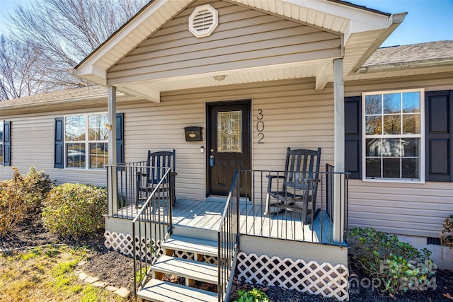 entrance to property with covered porch