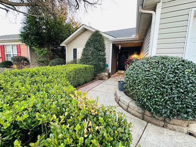 8430 Stoneman Pl, Charlotte, NC 28217 - entrance to property featuring roof with shingles