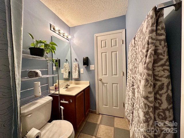 8430 Stoneman Pl, Charlotte, NC 28217 - full bath with a textured ceiling, vanity, and toilet