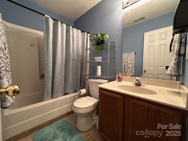 8430 Stoneman Pl, Charlotte, NC 28217 - bathroom with a textured ceiling, toilet, visible vents, vanity, and tile patterned floors