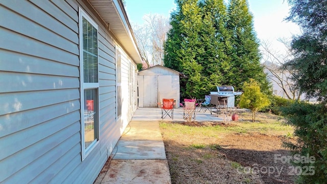 8430 Stoneman Pl, Charlotte, NC 28217 - view of yard with a patio area, an outdoor structure, and a shed