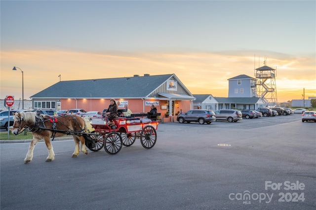 view of parking at dusk