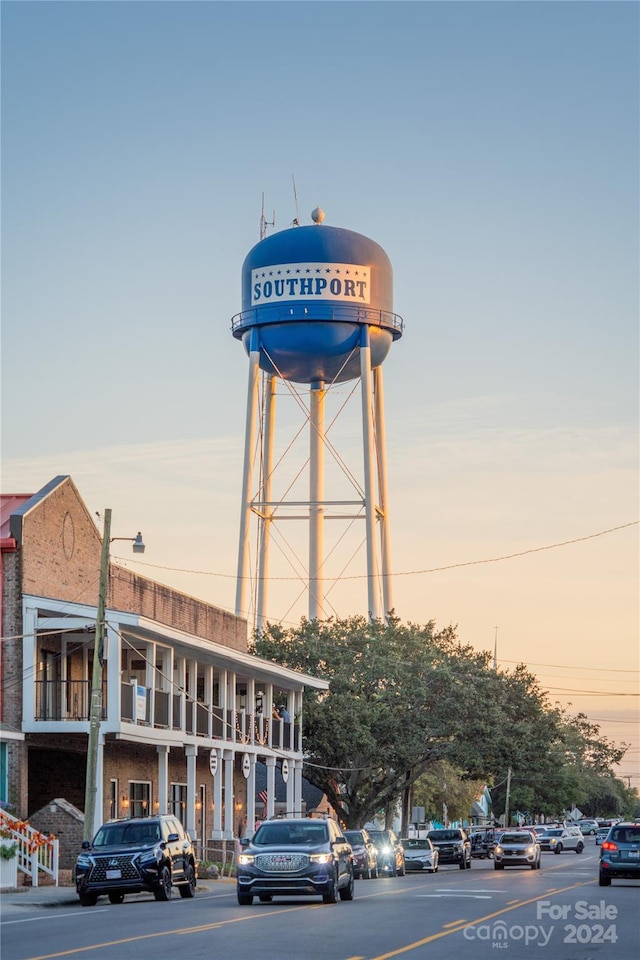 view of outdoor building at dusk