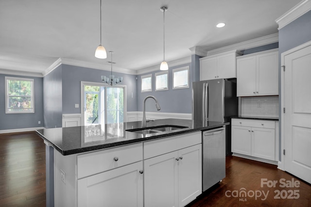 kitchen with white cabinetry, dishwasher, sink, dark hardwood / wood-style flooring, and a center island with sink