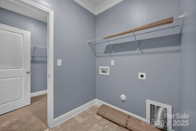 clothes washing area featuring hookup for a gas dryer, ornamental molding, light colored carpet, hookup for a washing machine, and electric dryer hookup