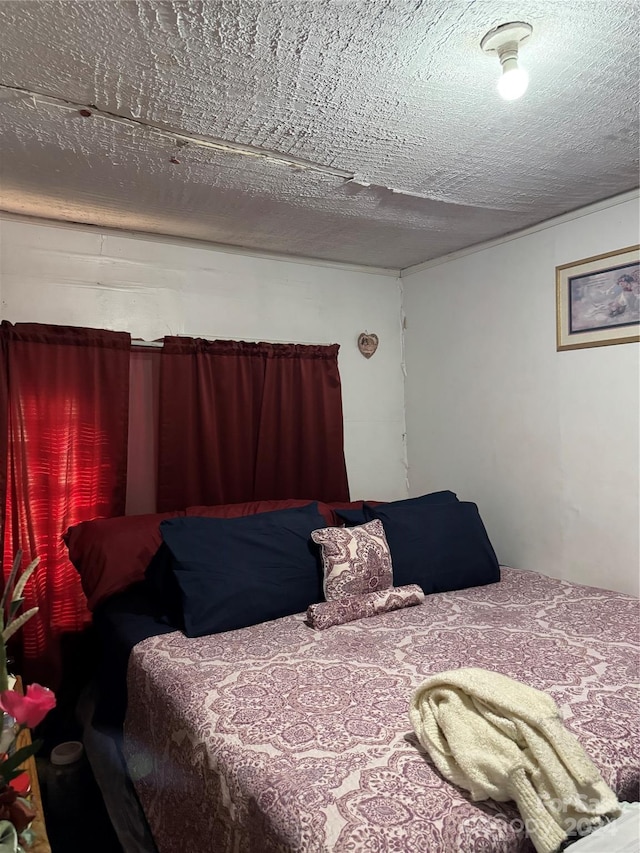 bedroom with a textured ceiling