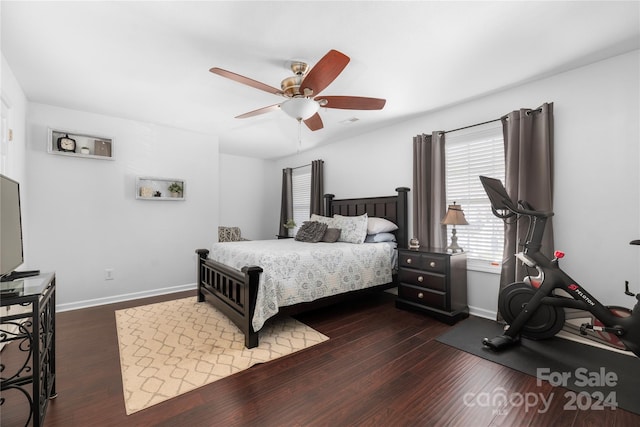 bedroom featuring dark hardwood / wood-style flooring and ceiling fan