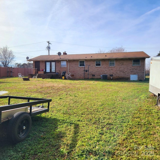 view of yard featuring central AC unit