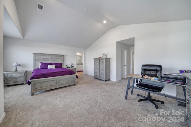 carpeted bedroom with lofted ceiling