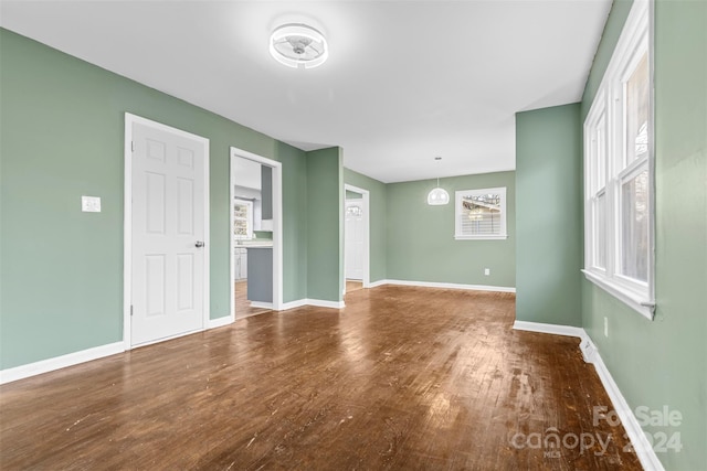 empty room featuring wood-type flooring