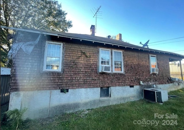 view of property exterior featuring central AC unit