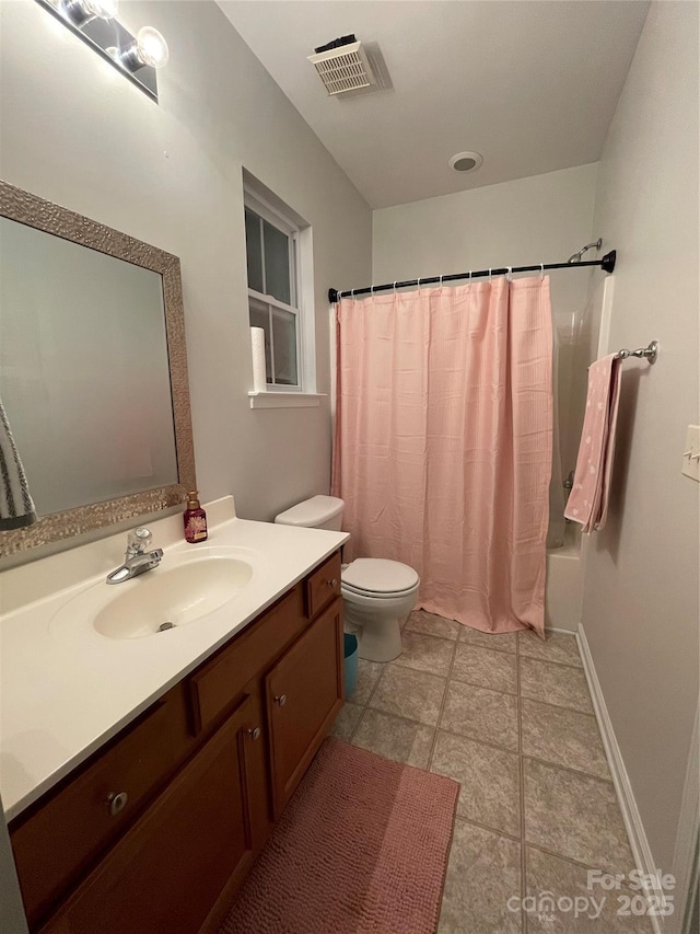 full bathroom with toilet, vanity, and shower / tub combo