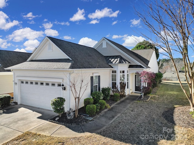 view of front of home with a garage