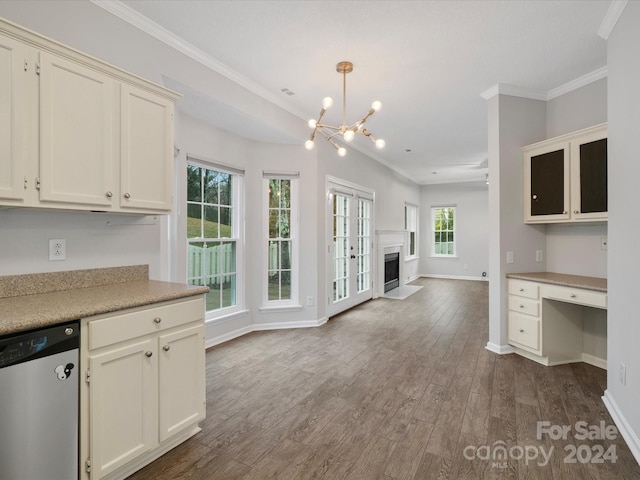 kitchen featuring hardwood / wood-style flooring, dishwasher, a healthy amount of sunlight, and pendant lighting