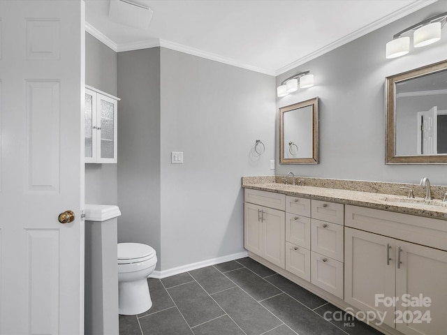 bathroom with crown molding, tile patterned flooring, vanity, and toilet