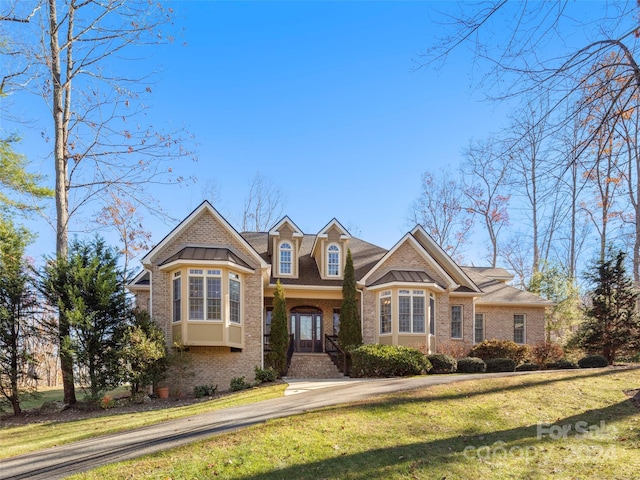 view of front of home with a front yard