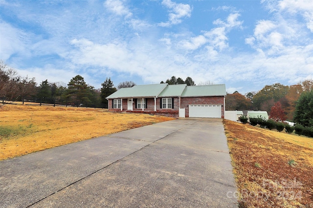 ranch-style home with a garage