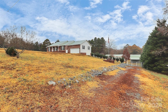 view of yard featuring a garage