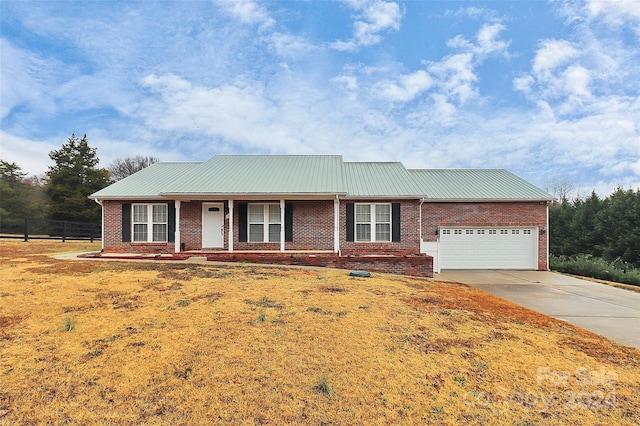 ranch-style house featuring a garage