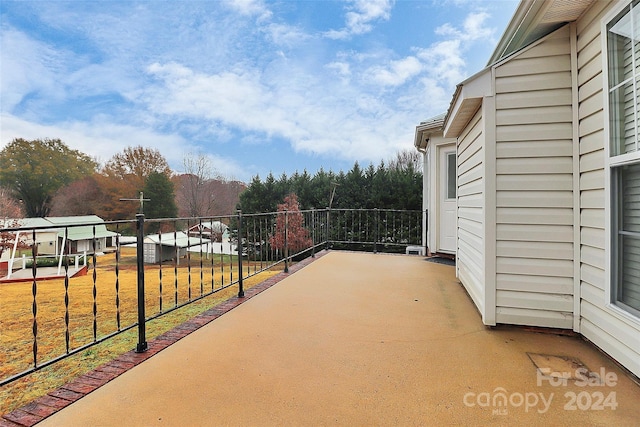 view of patio / terrace featuring a balcony