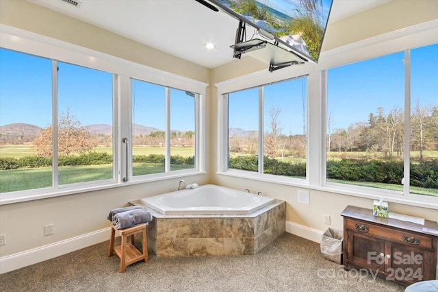 sunroom with a mountain view