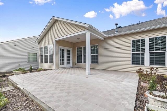 rear view of house featuring a patio