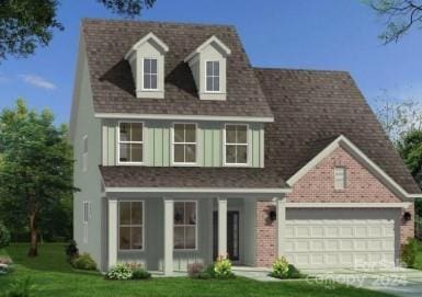 view of front of property featuring covered porch, a garage, and a front lawn