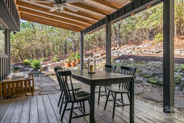 wooden deck with ceiling fan