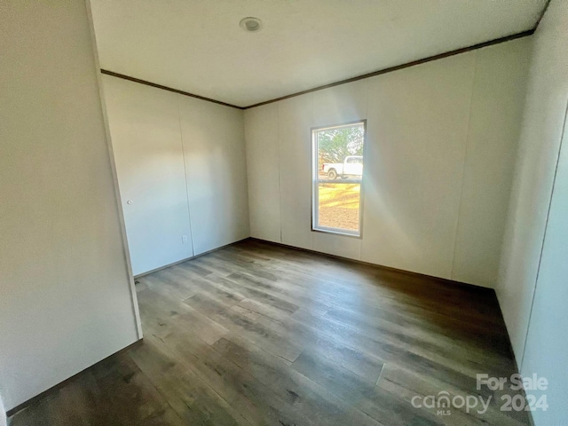 spare room featuring light wood-type flooring