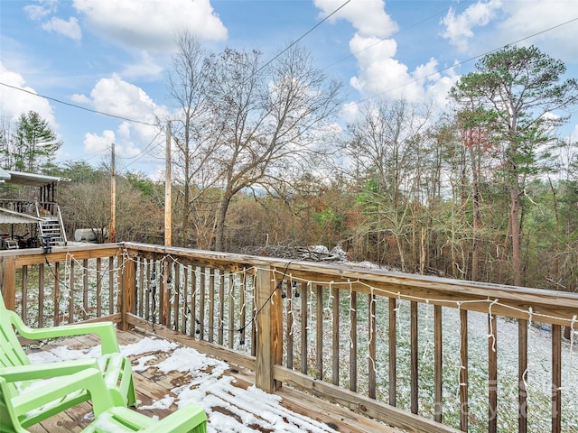 view of snow covered deck