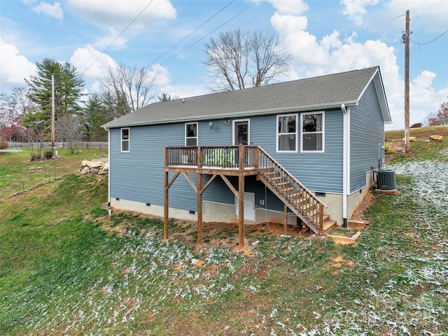 view of front facade with a front lawn, central AC, stairway, a wooden deck, and crawl space