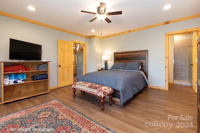 bedroom with hardwood / wood-style floors, ceiling fan, ornamental molding, and ensuite bath