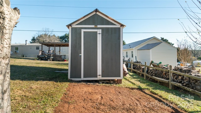 view of outdoor structure featuring a yard