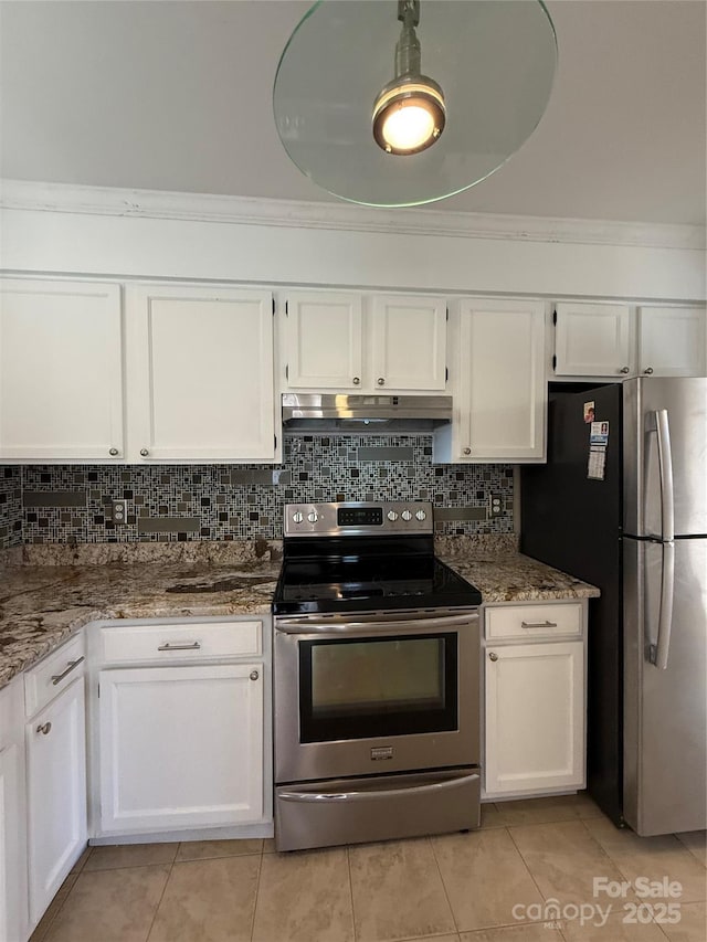 kitchen with white cabinets, stone counters, light tile patterned floors, and stainless steel appliances