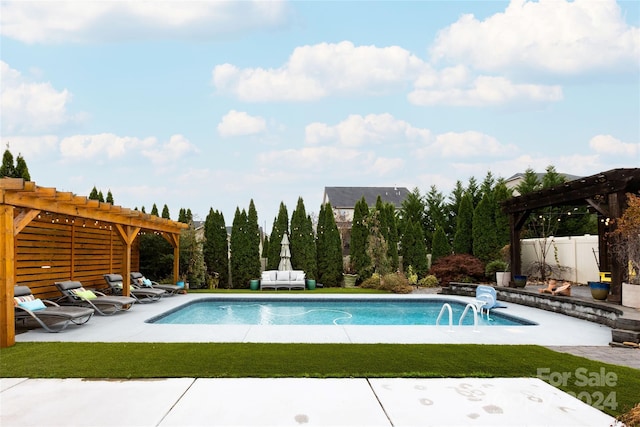 view of pool with a pergola and a patio