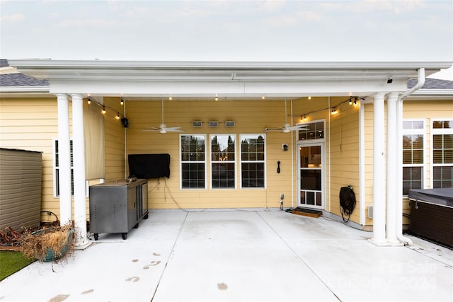 view of patio with ceiling fan