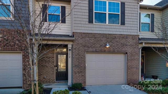 view of front of property featuring a garage