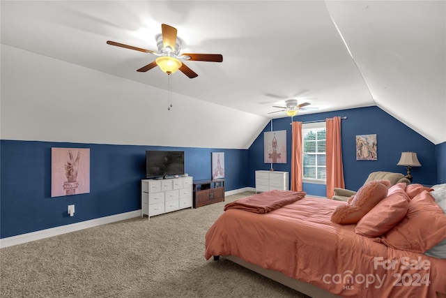 carpeted bedroom with vaulted ceiling and ceiling fan