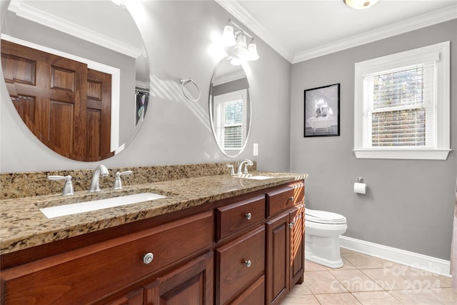 bathroom with tile patterned flooring, vanity, toilet, and crown molding