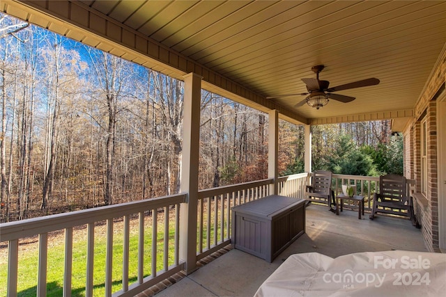 view of patio featuring ceiling fan