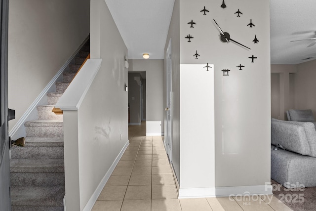 hallway with light tile patterned flooring