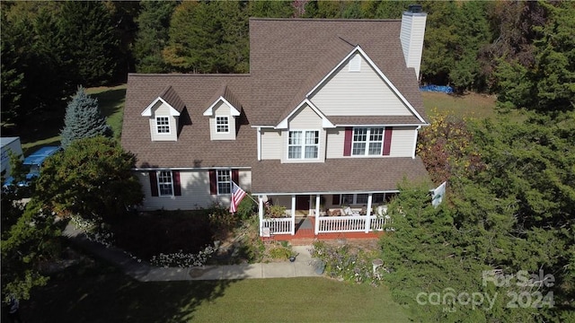 view of front facade with a porch and a front yard