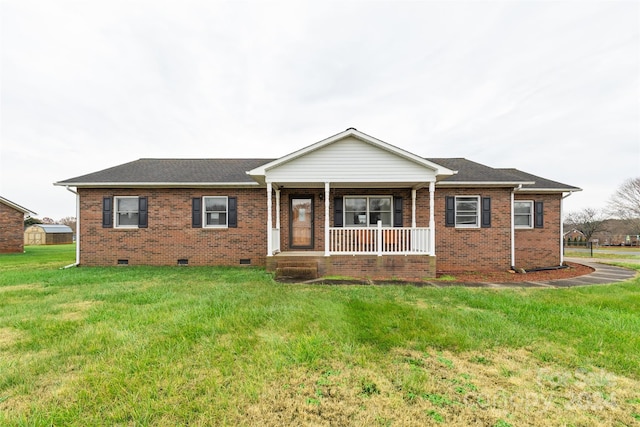 ranch-style house with a porch and a front yard