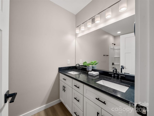 154 Aster Ridge Dr, Waynesville, NC 28786 - full bath with double vanity, wood finished floors, and a shower