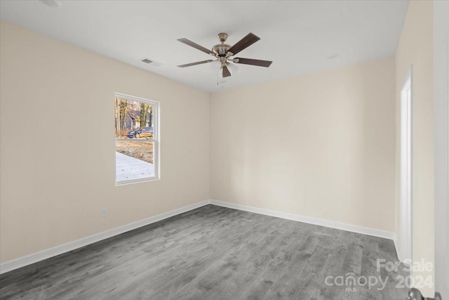 unfurnished room featuring hardwood / wood-style floors and ceiling fan