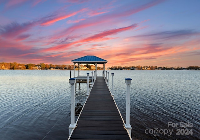 view of dock with a water view