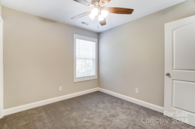 unfurnished room featuring carpet and ceiling fan