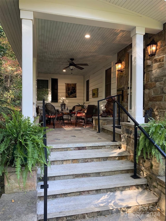 view of patio featuring ceiling fan